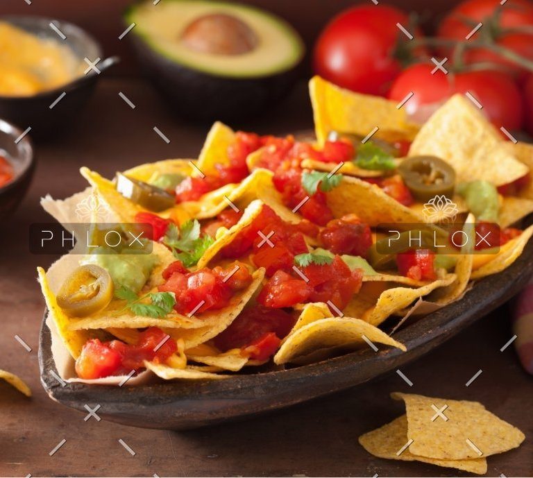 demo-attachment-1166-nachos-loaded-with-salsa-guacamole-cheese-and-P7GUFN7